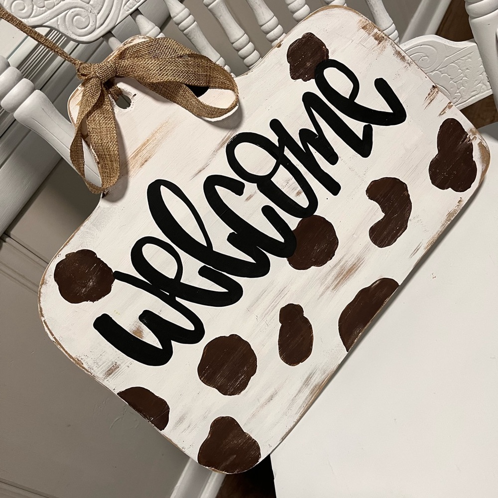 Cow print welcome door hanger